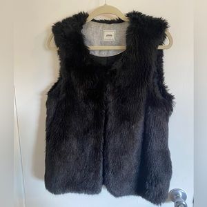 Super cute and stylish black fur vest. Really soft! Rarely wore and like new.